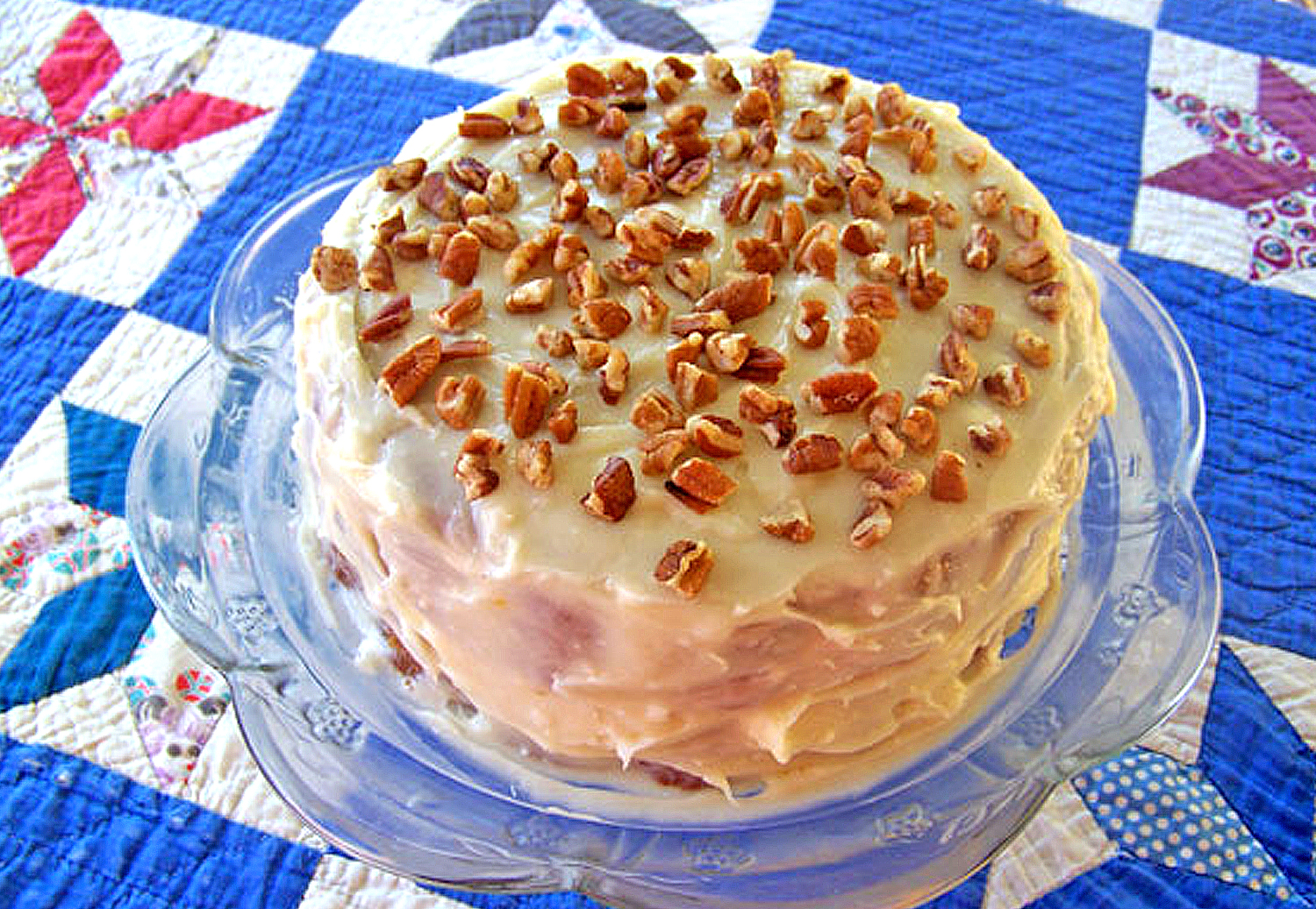 Pawpaw cake with frosting and nuts
