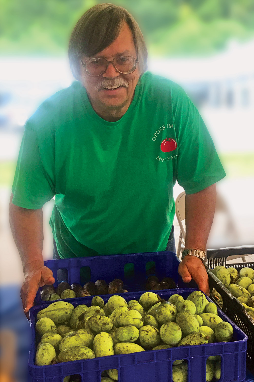 Irvin Coleman with pawpaws at the Pikeville Farmers Market