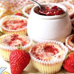 Indidvidual strawberry cheesecake jam swirls with fresh strawberries on a Kentucky Derby Platter