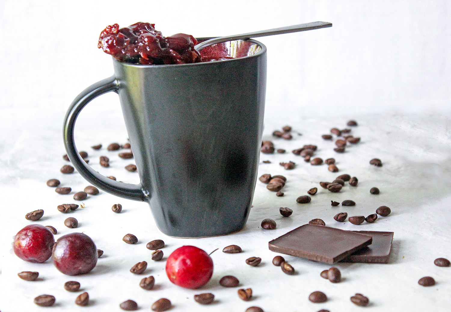 Black Mug of Cherry Coffee