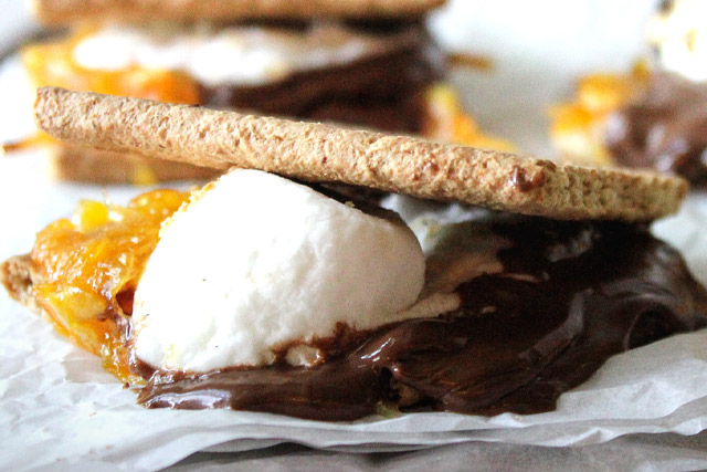 Orange Marmalade S'more layered with marshmallow, melted chocolate, and graham crackers.