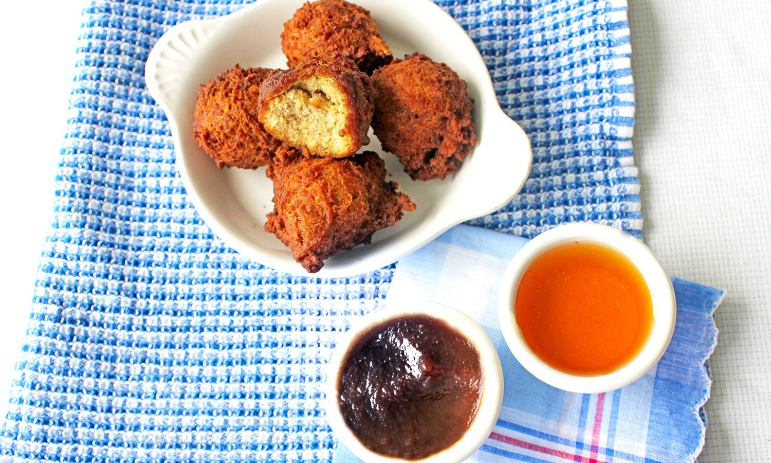Apple Fritter Bites with dipping bowls of apple butter and honey