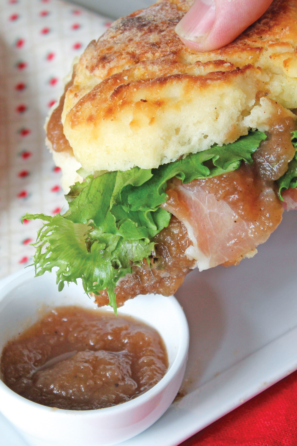 Southern biscuits with ham and apple butter are a party classic. Grab one now!