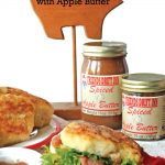Apple Butter Ham Biscuit on Plate with Apple Butter Jars