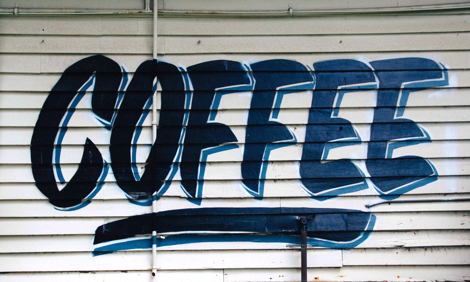 Graffiti sign advertising coffee