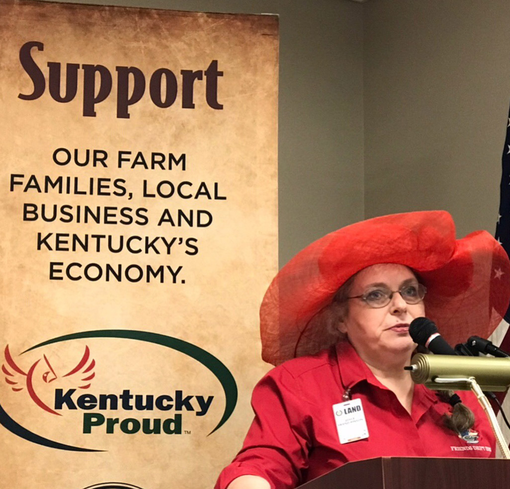 Joyce Pinson in big red hat advocating for Kentucky Proud agriculture