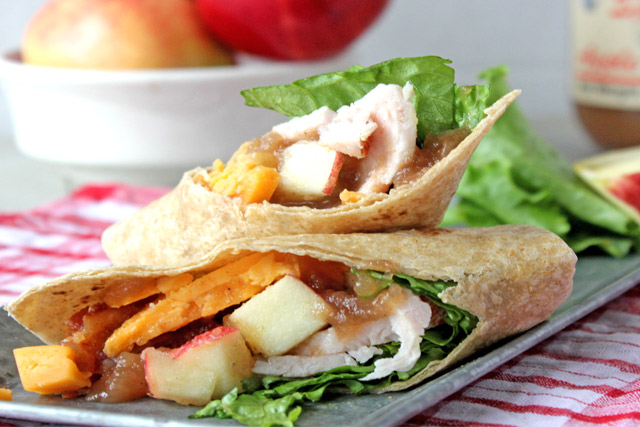 Turkey Wrap with apple butter cut on diagonal.
