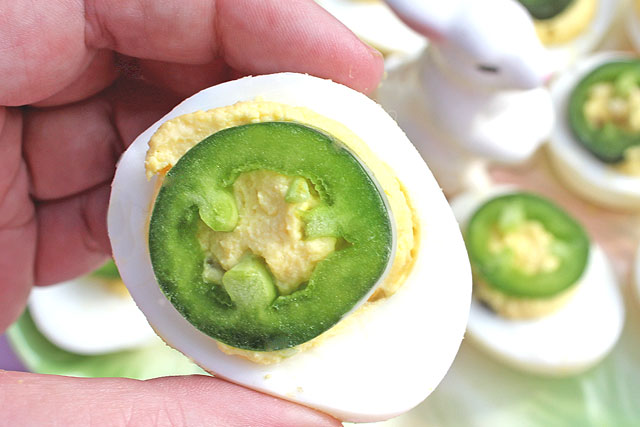 Jalapeno Deviled Egg in hand ready to eat